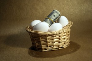 Basket with money and eggs it